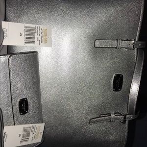 Michael Kors silver handbag and wallet
